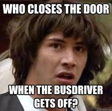 Who closes the door when the bus driver gets off?